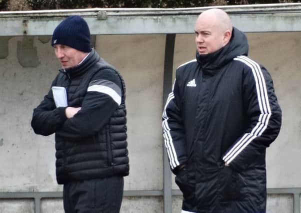 Bexhill United joint managers Nigel Kane (left) and Ryan Light look on from the technical area during last weekend's win away to AFC Varndeanians. Picture courtesy Mark Killy