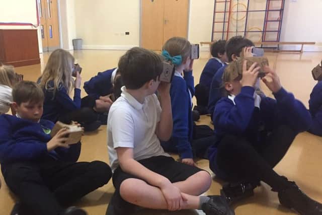 Pupils explored the surface of Mars and came face-to-face with dinosaurs in the virtual reality lesson