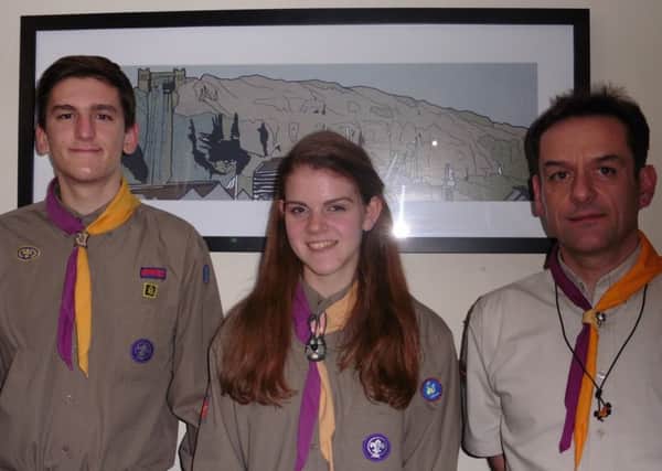 3rd Bexhill Explorers Eric Davis and Chloe Upton with Explorer Scout Leader Grant Docksey SUS-170802-094346001