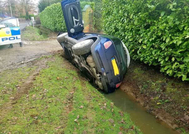 The driver sustained a suspected broken wrist and shock, police say. Picture: Sussex Police