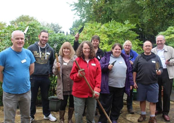 Volunteers who work in the garden at Linfield House, one of Guild Cares three care homes
