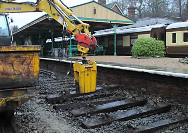 Track and sleepers being lifted from Horsted Keynes platform 3. Picture: Bruce Healey SUS-170602-153448001