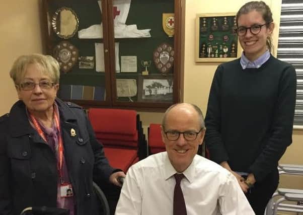 Nick Gibb with Red Cross representatives