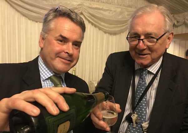 Tim Loughton and Sir Peter Bottomley tasting wine at the Palace of Westminster