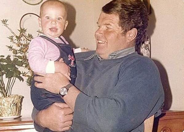 Amy Thorley as a baby with her dad Alan Bower