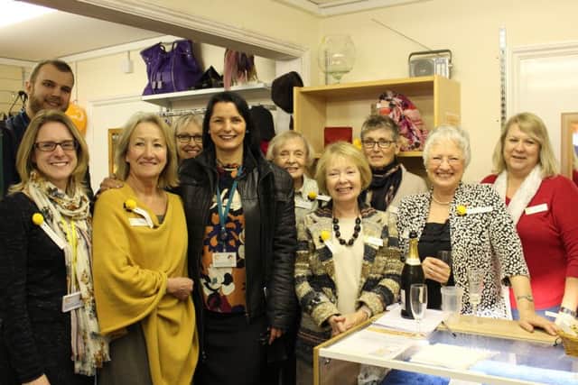 Staff and volunteers at the Chestnut Tree House charity shop in Arundel