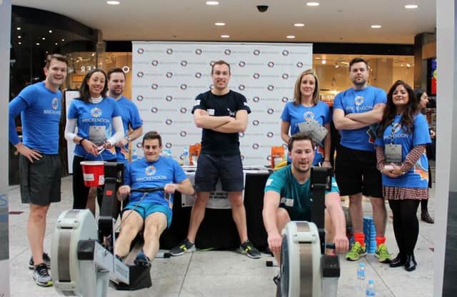 Doctors Adrift in the static rowing challenge against members of Brickendon Consultancy
