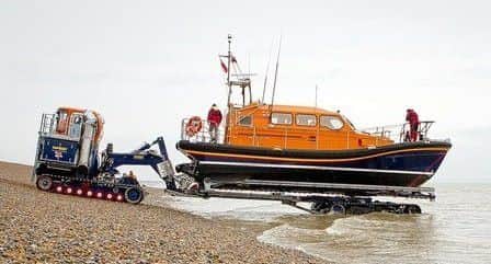 Launching a Shannon class lifeboat in Hastings. Photo courtesy of Hastings RNLI SUS-170902-124253001