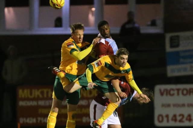 Jerrome Sobers goes up for a header against Horsham. Picture courtesy Scott White