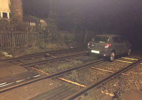 Car on the crossing at Yapton. Pic: Network Rail