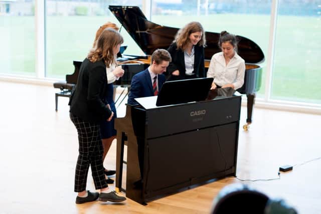 Students playing the Casio piano (Photograph: Darren Cool/ Caters News) SUS-170213-121431001
