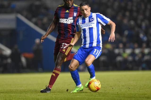 Anthony Knockaert is watched by Ipswich midfielder Toumani Diagouraga. Picture by Phil Westlake (PW Sporting Photography)