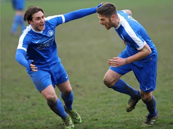 Robin Deen and Rob O'Toole celebrate the latter's goal against Eastbourne Town. Picture by Stephen Goodger