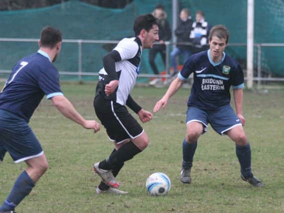 Action from East Preston's win against Ringmer on Saturday. Picture by Derek Martin