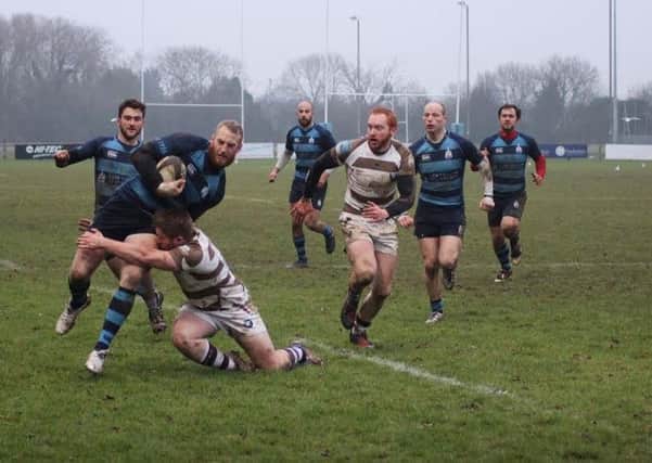 Ben Robson is tackled during Saturday's game at Southend Saxons. Picture by Alison Tanner