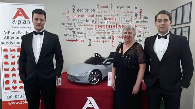 Win a mini Aston Martin! Cllr Margaret Bannister with Adrian Patrick (L) and Alex Mason of A-Plan (Photo by Ginny Sanderson)