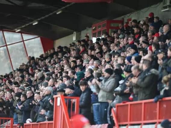 Crawley Town fans watching the recent Pay What You Can match against Hartlepool. Picture by Phil Westlake