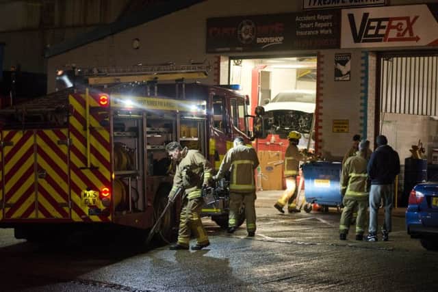 Four fire engines were called to the workshop. Pictures: Eddie Howland SUS-170216-104934001