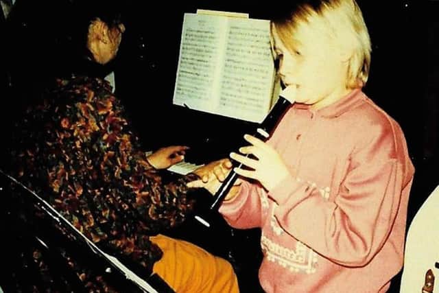Kate playing the recorder