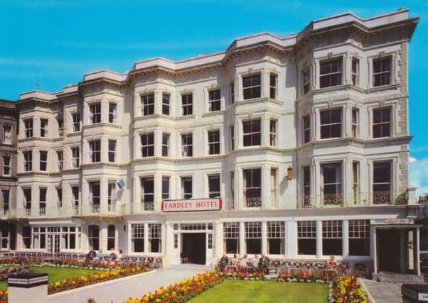 This postcard of the Eardley Hotel was published around 1970 by Photo Precision of St Ives, Huntingdon. At this period the hotel occupied the five eastern houses of the terrace, Nos 37, Marine Parade, and indeed No. 8, at far left, is not painted white as the Eardley is. The sign above the entrance on the right reads Tipple Bar.