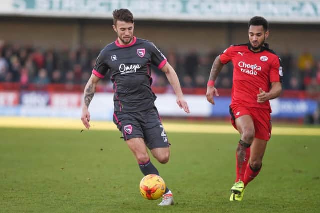 Crawley Town wing-back Jordan Roberts chases for the ball against Morecambe.
Picture by PW Sporting Photography.