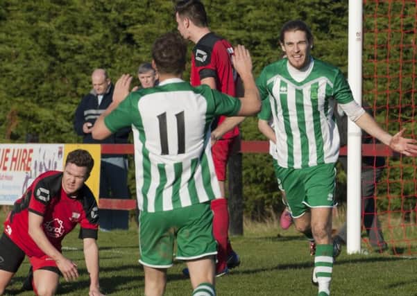 Scott Jones celebrates his goal for Chi City at Wick / Picture by Tommy McMillan