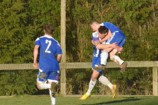 Celebrating the opening goal. AFC Uckfield v Haywards Heath Town. Picture by Grahame Lehkyj
