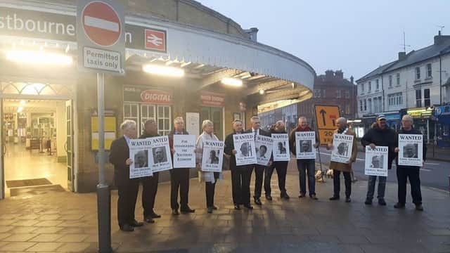 Business leaders demonstrating outside Eastbourne Railway Station SUS-170220-084127001