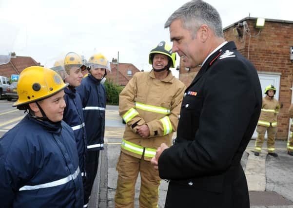 Lee Neale speaking to participants of the fire and rescue service's Firebreak course