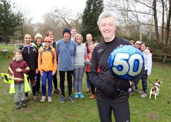 DM1727057a.jpg. Phil Liberman, Horsham Jogger and Parkrun organiser, will walk 100kms on his 50th birthday. Pictured with other Horsham Joggers. Photo by Derek Martin SUS-170219-004412008