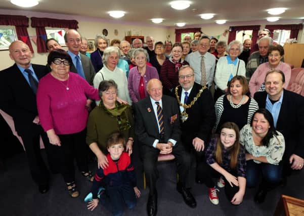 Worthing mayor Sean McDonald joins family and friends to celebrate with James Waters on his 100th birthday. Picture: Kate Shemilt ks170082-1