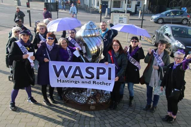 WASPI Hastings and Rother 'paint the town purple' in Hastings Old Town, Photo by Roberts Photographic. SUS-170220-130409001