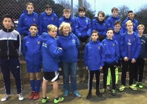 Southwick Rangers youth football team are delighted with their new rainjackets, funded by Adur East Lions Club
