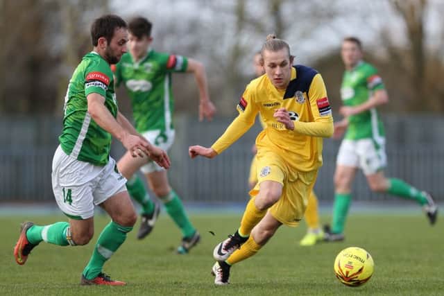Harry Stannard tries to take on the Guernsey defence during Sunday's 1-0 victory. Picture courtesy Scott White