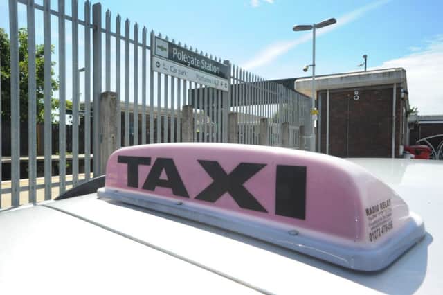 Taxi rank at Polegate railway Station (Photo by Jon Rigby) SUS-160707-002222008