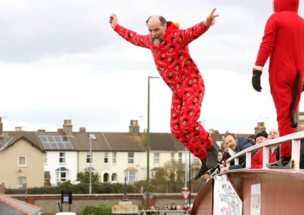 One 'jumper' getting involved in last year's Littlehampton Leap. Picture: Derek Martin
