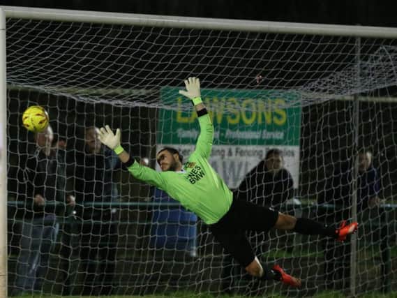 Three Bridges goalkeeper Martin Grant was man of the match against Hythe. 
Picture by Scott White