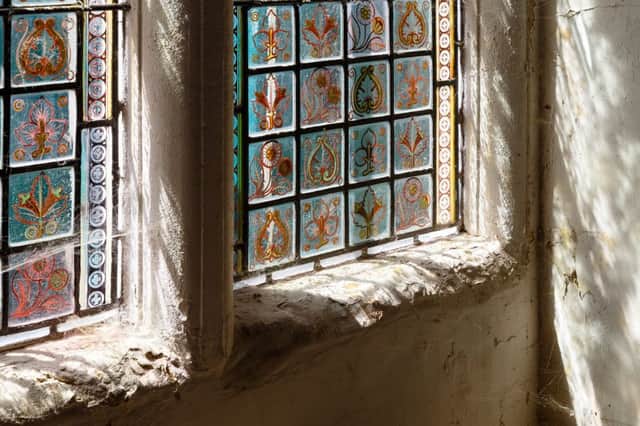 A stained glass window at Southover Grange, captured by Carlotta Luke