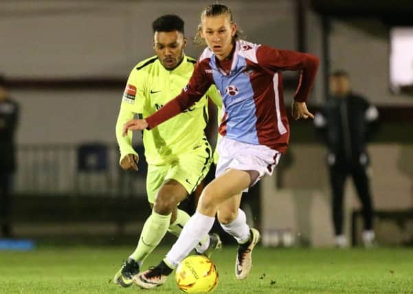 Harry Stannard on the ball against Carshalton Athletic last night. Picture courtesy Scott White