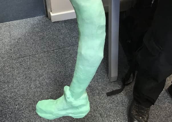 Papier-mache leg left at Gatwick Airport. Photo by Gatwick Police.