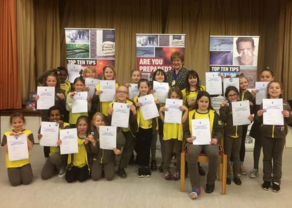 West Sussex County Council chairman Pat Arculus with 1st Pagham and Aldwick Brownies