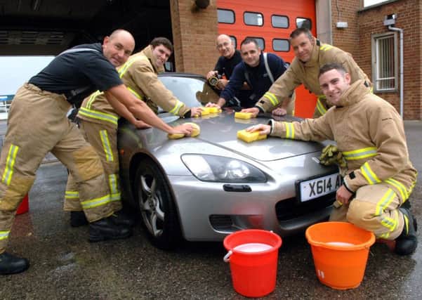 The firefighters will be washing cars in exchange for a charity donation ENGSNL00120110919093549