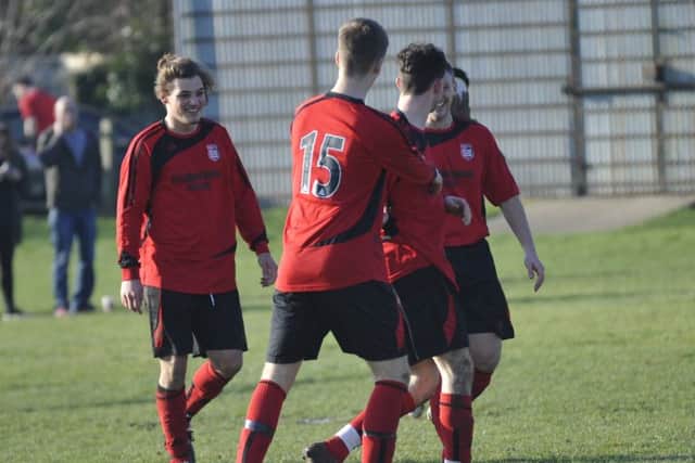 Rye Town celebrate one of their goals.