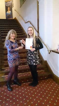 Judy Atkinson presents the Atkinson Cup to Katie-Louise Wren for Verse and song 16yrs and over SUS-170103-084320001