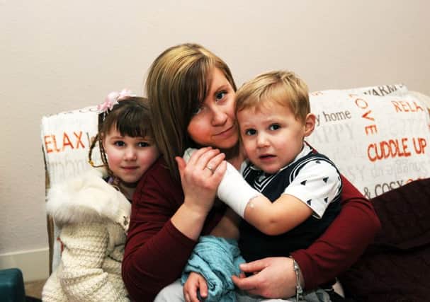 Melissa Organ with her son Tate Organ-Fuller and daughter Caitlyn-Page Fuller at their home in Eastbourne