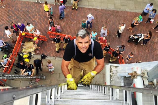 Acting executive director for communities & public protection and chief fire officer Lee Neale, who joined part of the WSFR charity climb at the Assembly Rooms in Chichester. SUS-160831-125933001