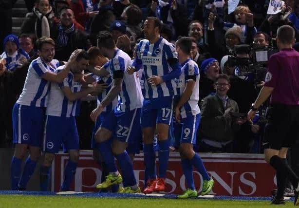 Brighton & Hove Albion players celebrate Jamie Murphy's goal. Picture by PW Sporting Pics
