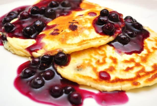 A pancake with blueberries