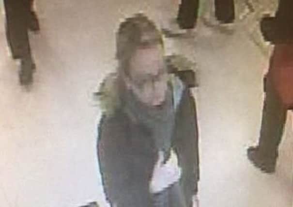 Police are looking for this woman in connection with a mobile theft