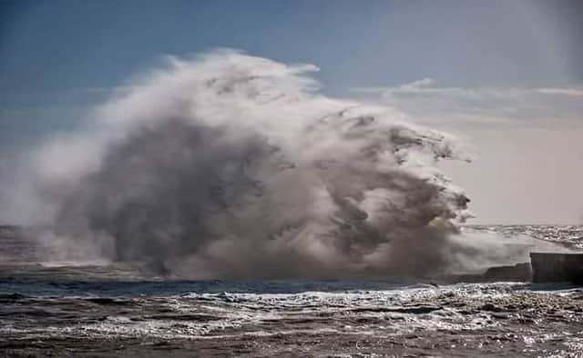 The sea hitting the Harbour Arm during Storm Doris last week. Photo by Brian Bailey SUS-170228-100914001